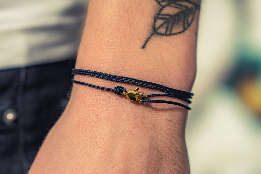 Cord bracelet with clasp - Blue with golden clasp